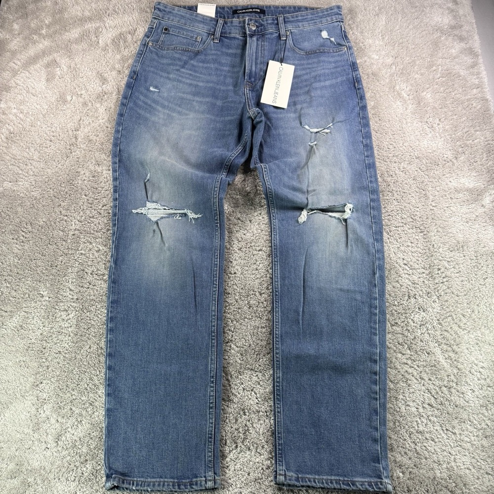 Calvin Klein Jeans Mens 32x30 Athletic Taper Distressed Blue Stretch Denim NWT